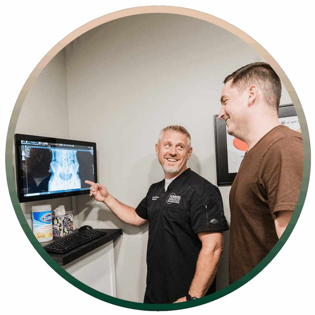 Dr. Cory Powers showing patient xray result